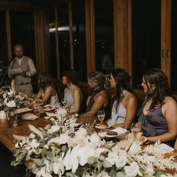 Best man giving his speech during a wedding reception in the restaurant