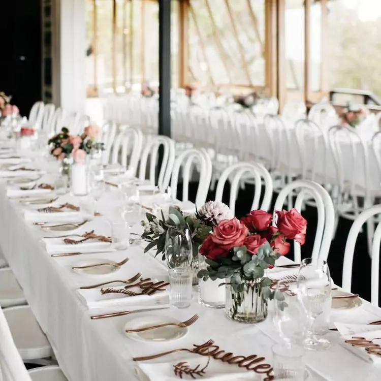 Tables set for a wedding at Wise Eagle Bay restaurant